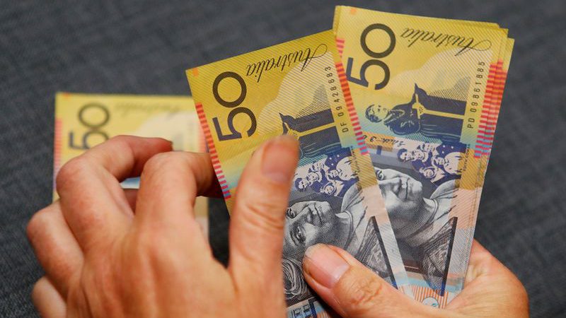 Aussie dollar near six-week peak as easing lockdowns spur risk