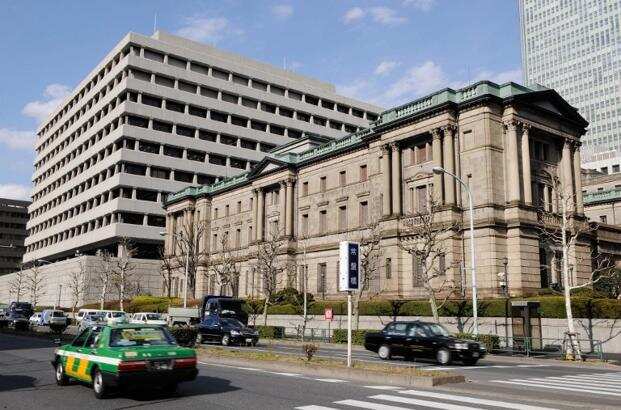 Bank of Japan holds fire, pledges $1 trillion to struggling firms